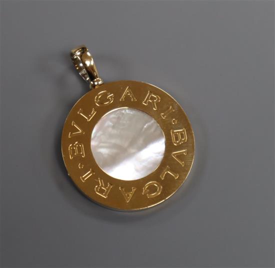 A Bulgari 18ct gold, steel and mother of pearl disc pendant (lacking necklace but in original Bulgari boxes), overall 47mm.